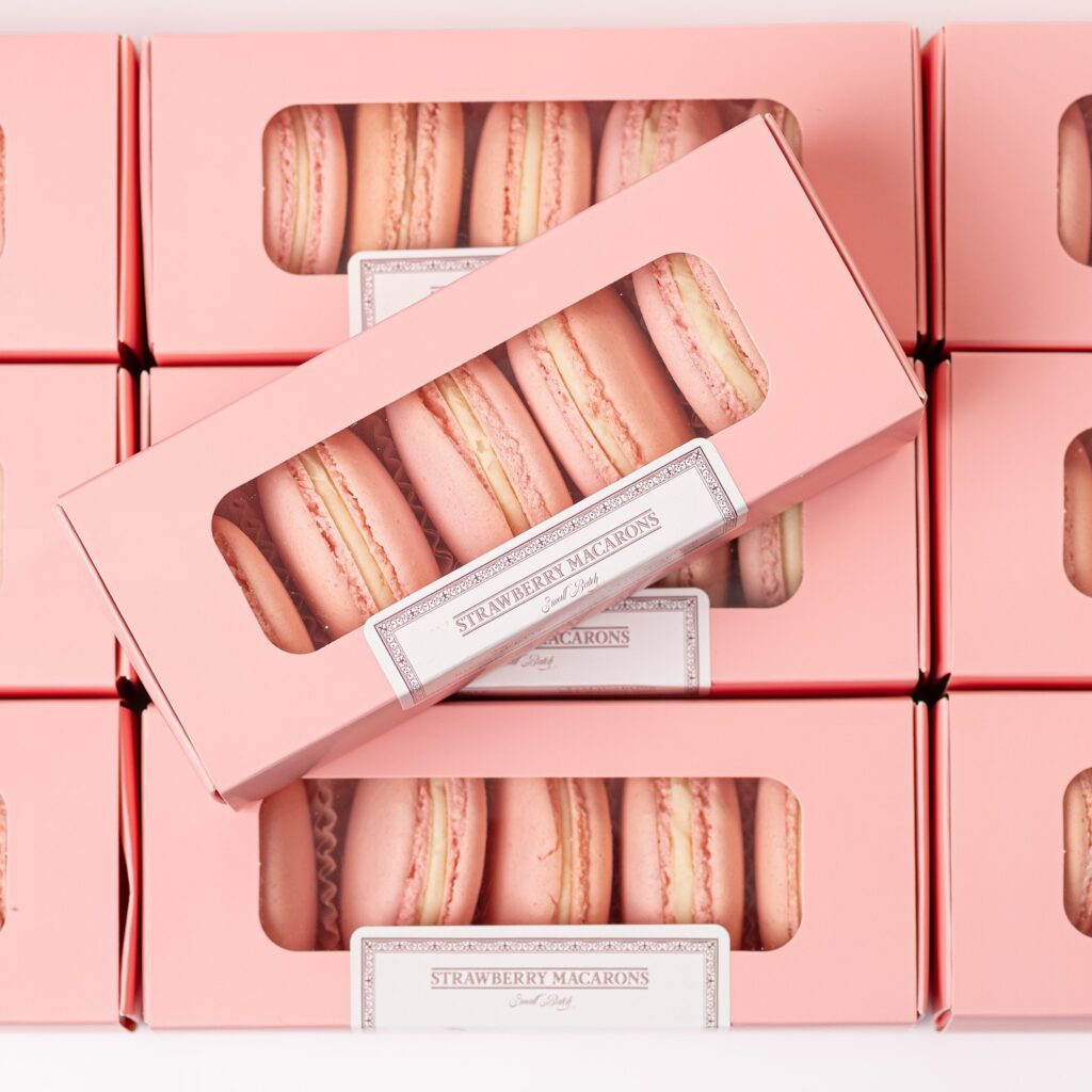 Rows of macaron boxes from Bien Mérité in Corpus Christi.