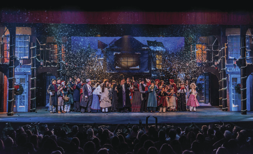 The cast of "A Christmas Carol" live on stage at the Harbor Playhouse in Corpus Christi, Texas.